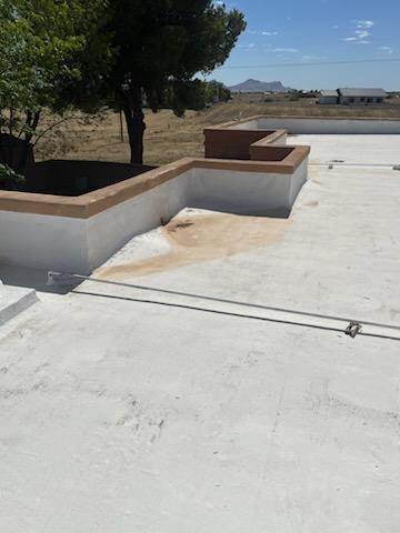 Before: Another damaged roof area